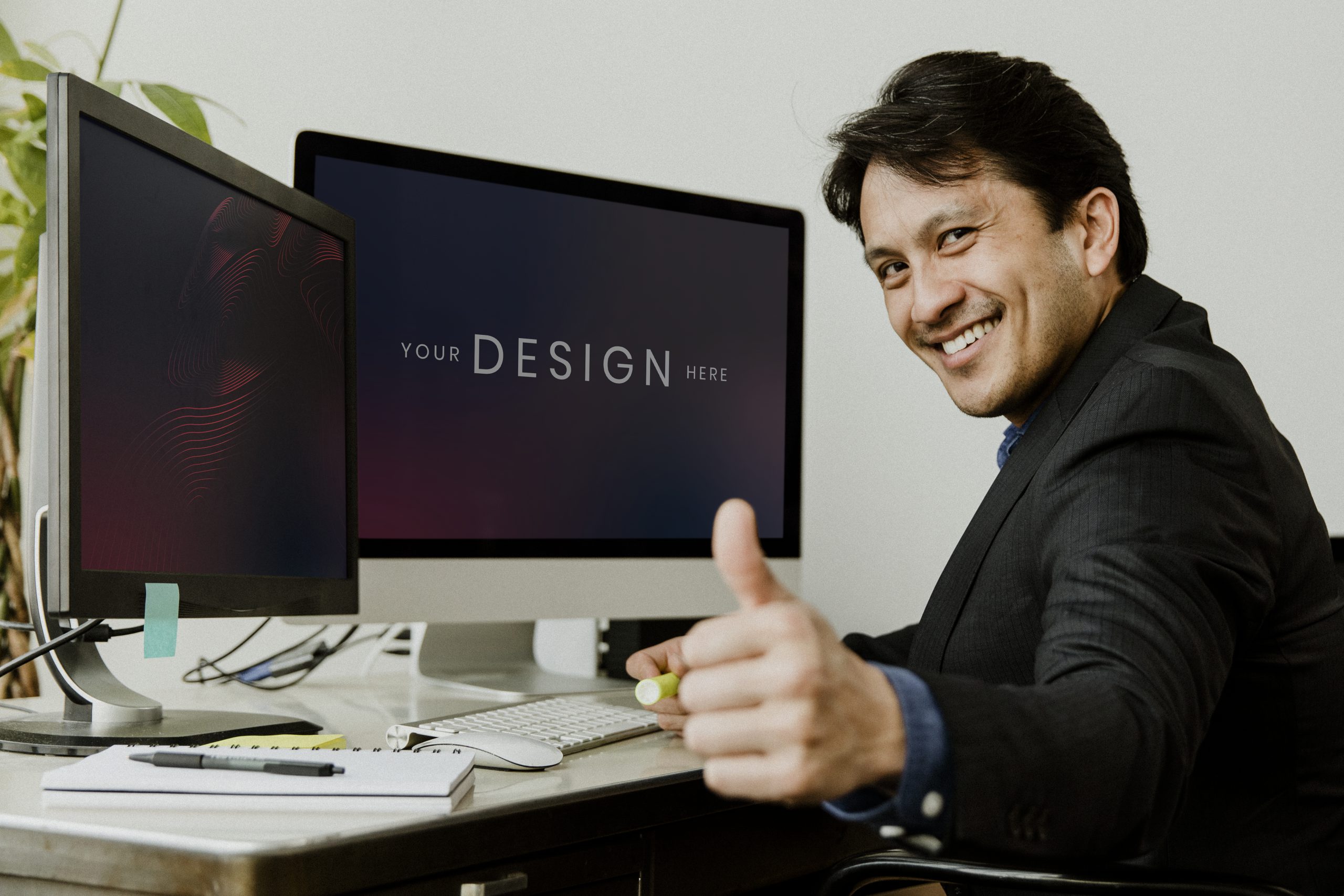 Happy businessman doing a thumbs up